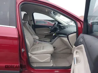 2015 Ford Escape SE with VIN 1FMCU0GXXFUC74470, listed as a IAAI auction lot 41419669 with 94,107 mi miles. Bid and sale history available at carsss.com. Image 5.