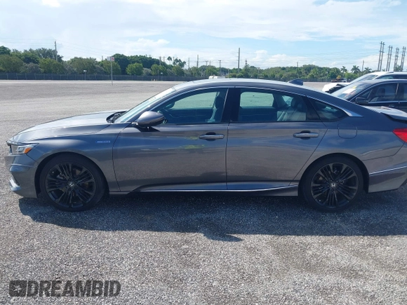 2022 Honda Accord Touring with VIN 1HGCV3F91NA031010, listed as a IAAI auction lot 40302407 with 18,820 mi miles and . Bid and sale history available at DreamBid. Image 14.