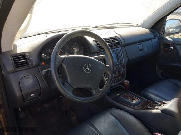 2001 Mercedes-Benz M-Class with VIN 4JGAB72E51A247926, listed as a IAAI auction lot 41277111 with 208,817 mi miles. Bid and sale history available at carsss.com. Image 13.