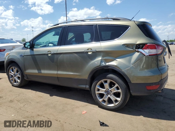 2013 Ford Escape SEL z VIN 1FMCU9H93DUD67848, wystawiony jako Copart lot #57221755 z przebiegiem 129 671 mil mil oraz Czysty tytuł • Clean title. Historia ofert i sprzedaży dostępna na DreamBid. Obrazek 2.