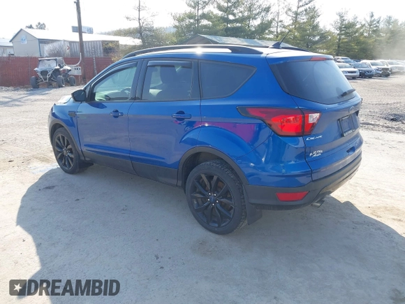 2019 Ford Escape SE with VIN 1FMCU9GD7KUB44070, listed as a IAAI auction lot 41801706 with 77,612 mi miles. Bid and sale history available at carsss.com. Image 3.