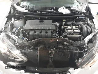 2019 Nissan Sentra S z VIN 3N1AB7APXKY240431, wystawiony jako IAAI lot #41722182 z przebiegiem 81 450 mil mil oraz . Historia ofert i sprzedaży dostępna na DreamBid. Obrazek 10.