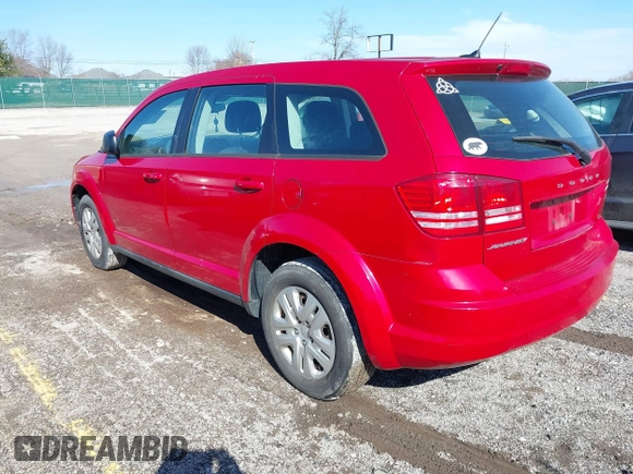 2014 Dodge Journey American Value Pkg with VIN 3C4PDCAB8ET170668, listed as a IAAI auction lot 41662590 with 167,776 mi miles. Bid and sale history available at carsss.com. Image 3.