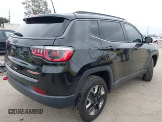 2018 Jeep Compass Trailhawk with VIN 3C4NJDDB3JT451658, listed as a IAAI auction lot 42087588 with 90,189 mi miles and . Bid and sale history available at DreamBid. Image 4.