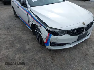 2016 BMW 3 Series GT 328i xDrive with VIN WBA8Z5C52GG502293, listed as a IAAI auction lot 42007325 with 64,659 mi miles. Bid and sale history available at carsss.com. Image 17.