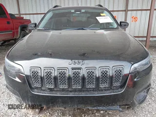 2020 Jeep Cherokee Altitude with VIN 1C4PJLLB8LD585577, listed as a IAAI auction lot 41372097 with 99,377 mi miles. Bid and sale history available at carsss.com. Image 12.