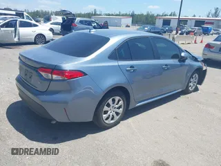 2023 Toyota Corolla LE with VIN 5YFB4MDE9PP016692, listed as a IAAI auction lot 42136141 with 34,671 mi miles and . Bid and sale history available at carsss.com. Image 4.
