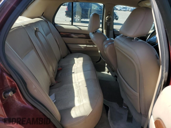 2004 Mercury Grand Marquis LS Premium z VIN 2MEHM75W34X636723, wystawiony jako Copart lot #54144055 z przebiegiem 161 886 mil mil oraz Szkoda całkowita • Salvage title. Historia ofert i sprzedaży dostępna na DreamBid. Obrazek 10.