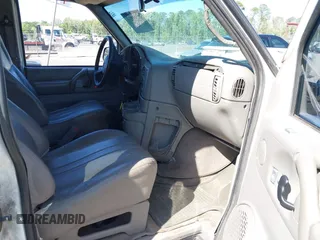2005 Chevrolet Astro with VIN 1GNDM19X15B125037, listed as a IAAI auction lot 42027571 with 260,176 mi miles. Bid and sale history available at carsss.com. Image 5.