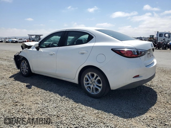 2016 Scion iA z VIN 3MYDLBZV6GY141773, wystawiony jako Copart lot #58448315 z przebiegiem Nie podano mil oraz Szkoda całkowita • Salvage title. Historia ofert i sprzedaży dostępna na DreamBid. Obrazek 2.