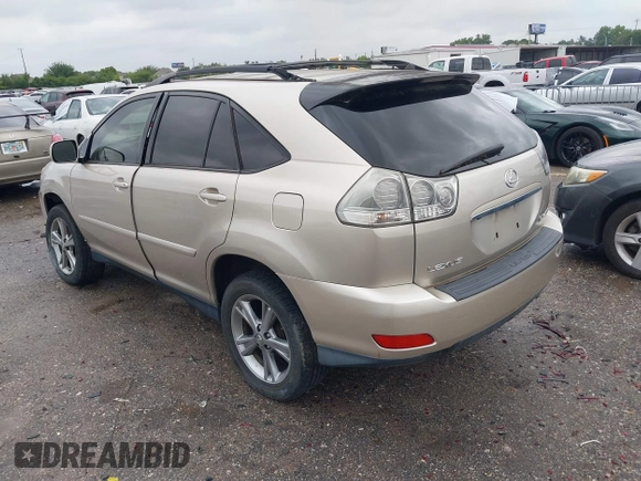 2006 Lexus RX 400h with VIN JTJHW31U060004642, listed as a IAAI auction lot 42207589 with 158,506 mi miles and . Bid and sale history available at DreamBid. Image 3.