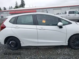 2020 Honda Fit Sport z VIN 3HGGK5H68LM715075, wystawiony jako IAAI lot #42135559 z przebiegiem Nie podano mil oraz . Historia ofert i sprzedaży dostępna na DreamBid. Obrazek 12.