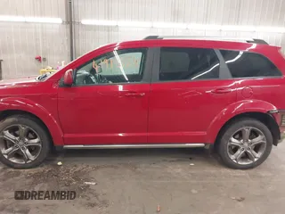 2016 Dodge Journey Crossroad Plus z VIN 3C4PDDGGXGT245673, wystawiony jako IAAI lot #41915165 z przebiegiem 124 861 mil mil oraz . Historia ofert i sprzedaży dostępna na DreamBid. Obrazek 15.