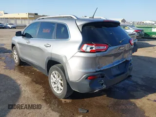 2016 Jeep Cherokee Latitude with VIN 1C4PJMCB5GW218166, listed as a IAAI auction lot 40458497 with 145,272 mi miles and . Bid and sale history available at carsss.com. Image 3.