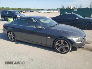 2007 BMW 3 Series 335i with VIN WBAWL73597PX50397, listed as a Copart auction lot 57221765 with 124,787 mi miles and Salvage title. Bid and sale history available at DreamBid. Image 4.