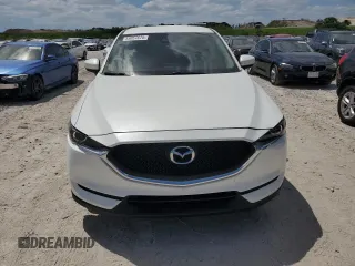 2018 Mazda CX-5 Sport with VIN JM3KFBBM2J0330444, listed as a Copart auction lot 53057675 with 121,747 mi miles and Clean Title. Bid and sale history available at carsss.com. Image 5.
