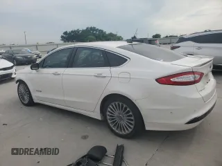 2013 Ford Fusion Titanium Hybrid с VIN 3FA6P0RU3DR282013, выставлен на аукционе Copart как лот 53651595 с пробегом 133 214 миль миль и Списание • Salvage title. История ставок и продаж доступна на DreamBid. Изображение 2.