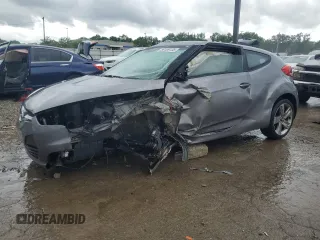 2012 Hyundai Veloster w/Black Int с VIN KMHTC6AD3CU072814, выставлен на аукционе Copart как лот 59109135 с пробегом Не указан миль и На запчасти • Non repairable. История ставок и продаж доступна на DreamBid. Изображение 1.