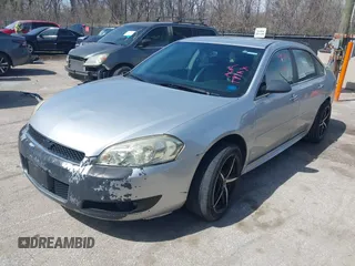 2013 Chevrolet Impala LTZ with VIN 2G1WC5E38D1235332, listed as a IAAI auction lot 41891472 with 137,567 mi miles and . Bid and sale history available at DreamBid. Image 2.