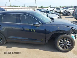 2020 Mazda CX-9 Touring with VIN JM3TCACY1L0419630, listed as a IAAI auction lot 42282675 with 105,207 mi miles and . Bid and sale history available at DreamBid. Image 14.