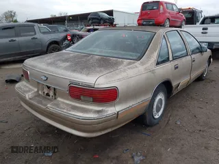 1994 Chevrolet Caprice Classic 1SA Special Value Pkg with VIN 1G1BL52W2RR201821, listed as a IAAI auction lot 41884064 with 186,192 mi miles. Bid and sale history available at carsss.com. Image 4.