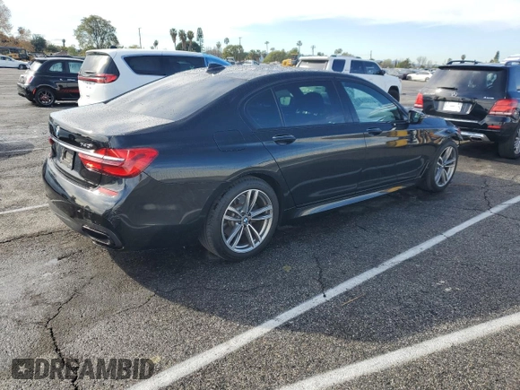 2017 BMW 7 Series 740i with VIN WBA7E2C59HG739693, listed as a Copart auction lot 42599835 with 90,061 mi miles and Salvage Title. Bid and sale history available at carsss.com. Image 3.