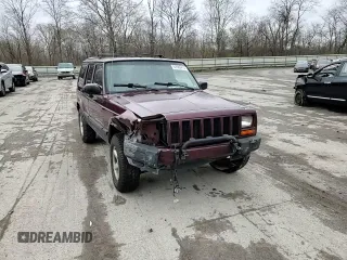 2000 Jeep Cherokee z VIN 1J4FF48S0YL254270, wystawiony jako Copart lot #52589415 z przebiegiem 166 860 mil mil oraz Szkoda całkowita • Salvage title. Historia ofert i sprzedaży dostępna na DreamBid. Obrazek 12.