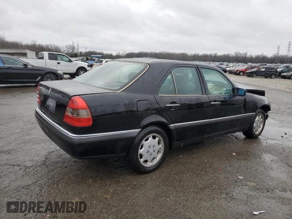 1996 Mercedes-Benz C with VIN WDBHA28E7TF328169, listed as a Copart auction lot 83653124 with 282,232 mi miles and Salvage Title. Bid and sale history available at carsss.com. Image 3.
