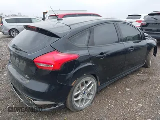2015 Ford Focus SE with VIN 1FADP3K24FL302773, listed as a IAAI auction lot 41967128 with 202,193 mi miles. Bid and sale history available at carsss.com. Image 4.