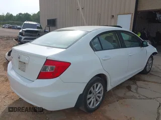 2012 Honda Civic EX with VIN 2HGFB2F82CH309404, listed as a IAAI auction lot 42080934 with 173,136 mi miles and . Bid and sale history available at DreamBid. Image 4.