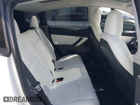 2021 Tesla Model Y Long Range with VIN 5YJYGDEE3MF081304, listed as a IAAI auction lot 41706240 with 90,510 mi miles and . Bid and sale history available at DreamBid. Image 8.