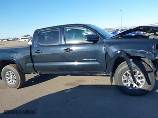 2019 Toyota Tacoma 4WD SR5 with VIN 3TMDZ5BN1KM060088, listed as a IAAI auction lot 41804525 with 69,893 mi miles. Bid and sale history available at carsss.com. Image 13.