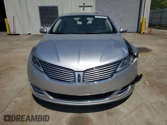 2013 Lincoln MKZ z VIN 3LN6L2GK5DR803943, wystawiony jako Copart lot #51714625 z przebiegiem 108 958 mil mil oraz Szkoda całkowita • Salvage title. Historia ofert i sprzedaży dostępna na DreamBid. Obrazek 5.