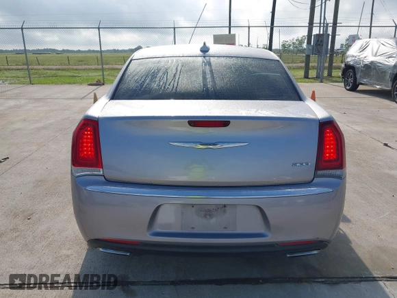 2016 Chrysler 300 Anniversary Edition with VIN 2C3CCAAG9GH211875, listed as a IAAI auction lot 42052083 with 209,251 mi miles and . Bid and sale history available at DreamBid. Image 16.