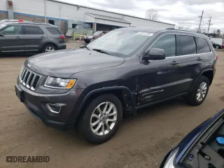 2015 Jeep Grand Cherokee Altitude with VIN 1C4RJFAG0FC209734, listed as a Copart auction lot 52973105 with 130,955 mi miles and Salvage Title. Bid and sale history available at carsss.com. Image 1.