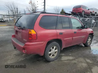 2004 GMC Envoy SLT with VIN 1GKDT13S942237743, listed as a Copart auction lot 85452894 with 192,043 mi miles and Salvage Title. Bid and sale history available at carsss.com. Image 3.