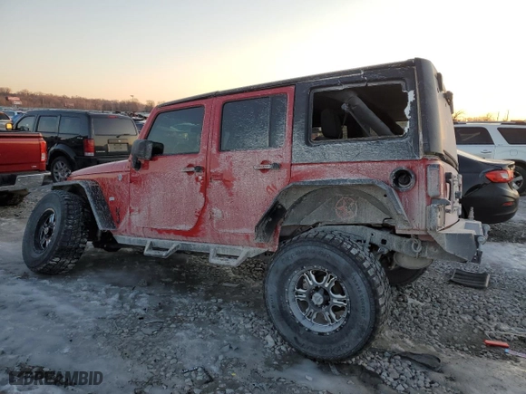 2012 Jeep Wrangler Unlimited Sport with VIN 1C4HJWDG7CL114297, listed as a Copart auction lot 42144525 with 165,482 mi miles and Salvage Title. Bid and sale history available at carsss.com. Image 2.
