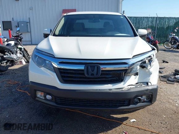 2017 Honda Ridgeline RTL-T z VIN 5FPYK3F69HB038048, wystawiony jako IAAI lot #42583177 z przebiegiem 183 564 mil mil oraz . Historia ofert i sprzedaży dostępna na DreamBid. Obrazek 13.