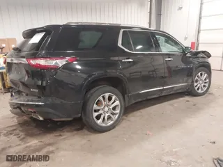 2018 Chevrolet Traverse Premier with VIN 1GNEVJKW6JJ179467, listed as a IAAI auction lot 41214356 with 93,931 mi miles. Bid and sale history available at carsss.com. Image 4.