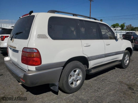 1999 Toyota Land Cruiser with VIN JT3HT05J0X0059222, listed as a Copart auction lot 77713294 with 406,869 mi miles and Clean Title. Bid and sale history available at carsss.com. Image 3.