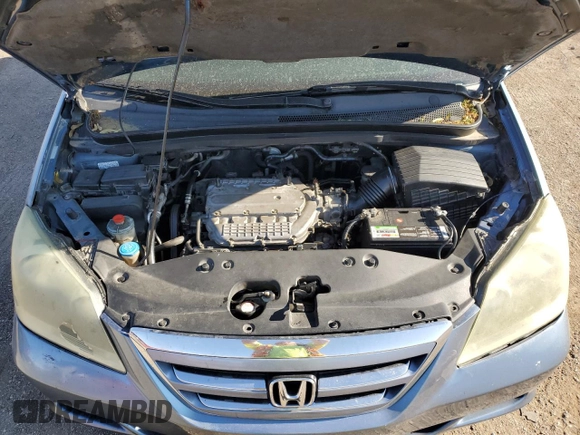 2005 Honda Odyssey EX-L with VIN 5FNRL38765B072878, listed as a Copart auction lot 54610815 with 271,460 mi miles and Salvage title. Bid and sale history available at DreamBid. Image 12.