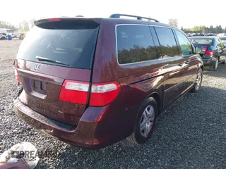 2007 Honda Odyssey EX-L z VIN 5FNRL38737B428660, wystawiony jako IAAI lot #42087846 z przebiegiem 176 479 mil mil oraz . Historia ofert i sprzedaży dostępna na DreamBid. Obrazek 4.