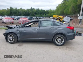 2016 Ford Focus SE z VIN 1FADP3F22GL327604, wystawiony jako IAAI lot #42319889 z przebiegiem 97 736 mil mil oraz . Historia ofert i sprzedaży dostępna na DreamBid. Obrazek 14.
