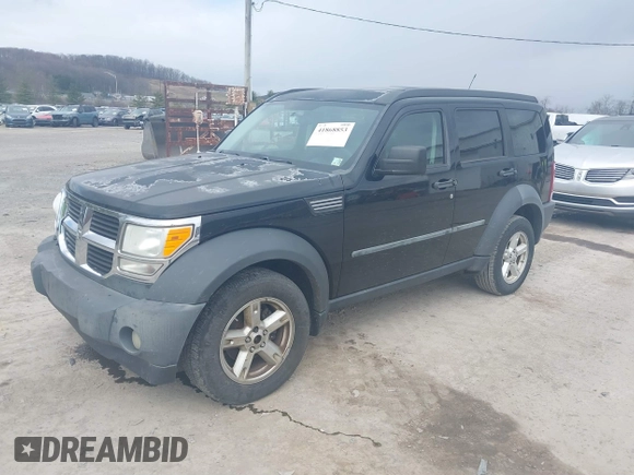 2007 Dodge Nitro SXT with VIN 1D8GU28K27W569672, listed as a IAAI auction lot 41868853 with 179,145 mi miles and . Bid and sale history available at carsss.com. Image 2.