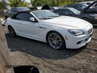 2014 BMW 6 Series 650i with VIN WBAYP9C56ED169396, listed as a Copart auction lot 71923624 with 44,678 mi miles and Clean Title. Bid and sale history available at DreamBid. Image 4.