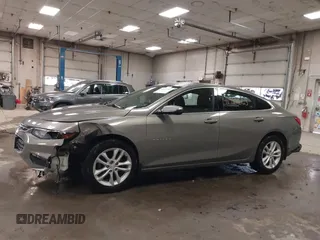2018 Chevrolet Malibu LT z VIN 1G1ZD5ST0JF185111, wystawiony jako IAAI lot #41910563 z przebiegiem 84 784 mil mil oraz . Historia ofert i sprzedaży dostępna na DreamBid. Obrazek 14.
