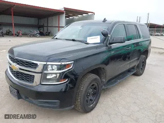 2019 Chevrolet Tahoe Commercial with VIN 1GNLCDECXKR231072, listed as a IAAI auction lot 41800007 with 100,101 mi miles. Bid and sale history available at carsss.com. Image 22.