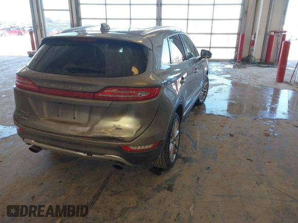 2016 Lincoln MKC Reserve with VIN 5LMCJ3C93GUJ19078, listed as a IAAI auction lot 41633487 with 91,961 mi miles and . Bid and sale history available at DreamBid. Image 4.