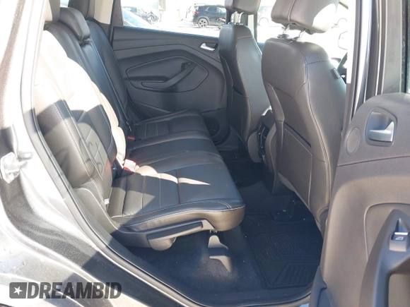 2015 Ford Escape Titanium with VIN 1FMCU9JX6FUB86304, listed as a IAAI auction lot 41595761 with 104,317 mi miles and . Bid and sale history available at DreamBid. Image 8.