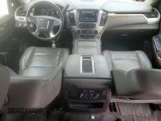 2017 GMC Yukon XL Denali with VIN 1GKS2HKJ3HR390983, listed as a Copart auction lot 68530834 with 160,214 mi miles and Salvage Title. Bid and sale history available at carsss.com. Image 8.